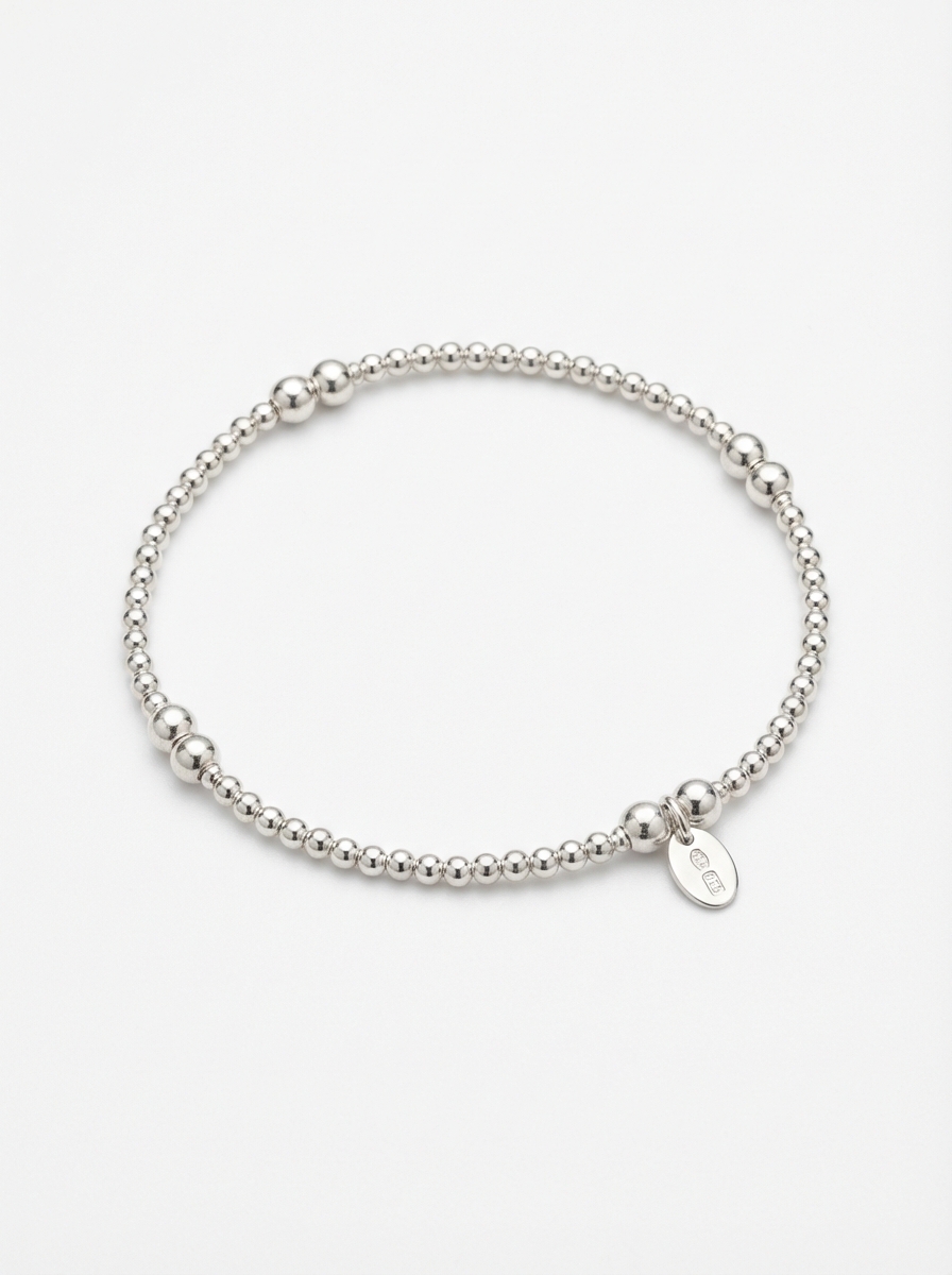 Pulsera elástica bolitas