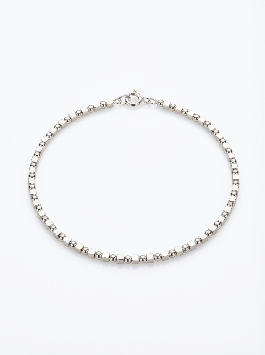 Pulsera bolitas y cubo combinado