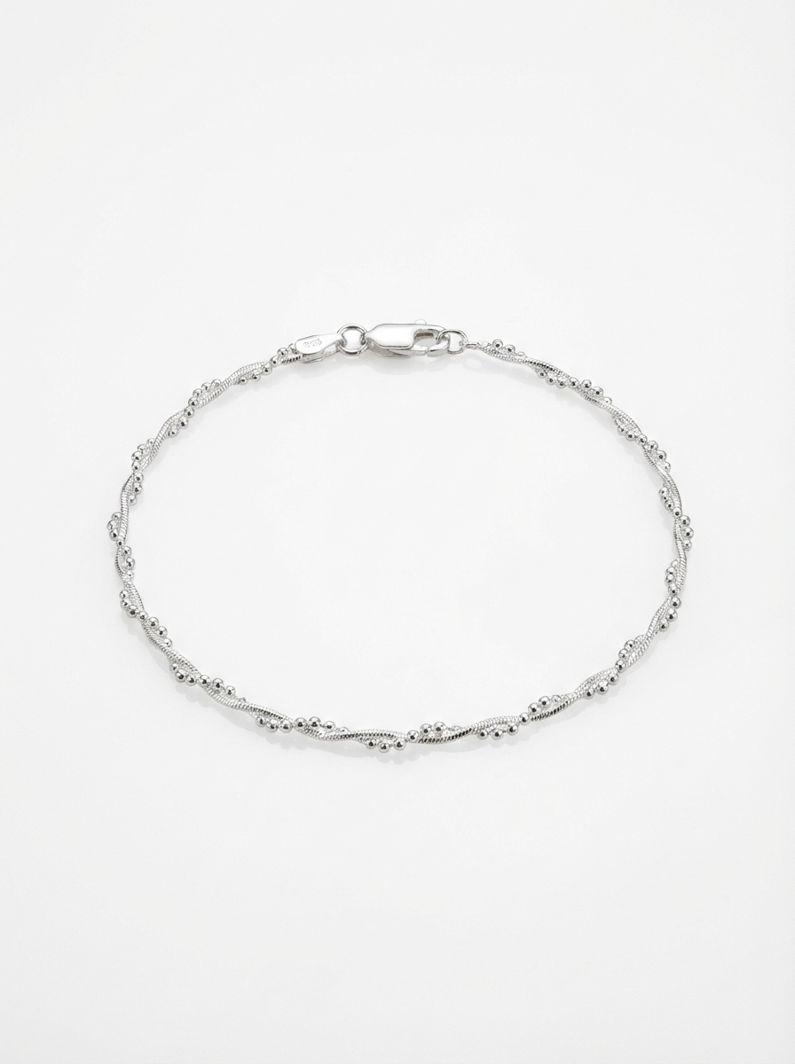 Pulsera trenzada con bolitas